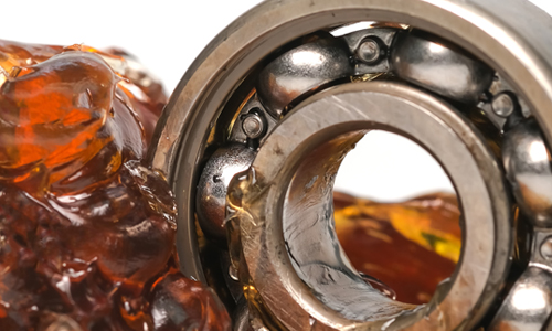 High-performance grease on a ball bearing